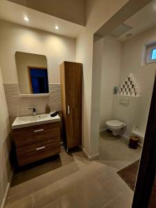 Appartements Le Carre Henaux : photos des chambres