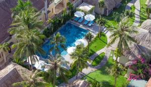 Coco Cottage Beachfront Resort
