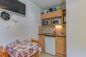 Appartements Les Lys Oranges : photos des chambres