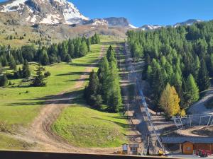 Appartements L- Eclat des Sommets en face et aux pieds des pistes : photos des chambres