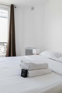 Appartements 2 pieces cosy hopital bichat - paris 18 - 2P : photos des chambres