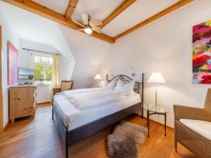 Ferienwohnung - Rügenbrise mit Seeblick mit 3 Bädern, Steg und Paddelboot - alle inklusive