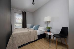 Unique Bright Studio for 4 People Remote Work & Balcony Close to PGE by Noclegi Renters