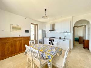 CASA ELAIO - immersa negli ulivi con vista sul mare Ionio