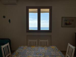 CASA ELAIO - immersa negli ulivi con vista sul mare Ionio