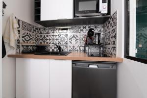 Appartements Studio Proche Port Terrasse et Wifi : photos des chambres