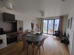 Appartements Le Quai des Bleus : photos des chambres