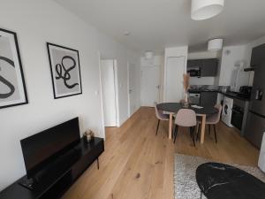 Appartements Le Quai des Bleus : photos des chambres