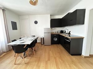 Appartements Le Quartier des Saveurs, proche des Halles Carnot : photos des chambres