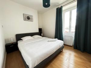 Appartements Le Quartier des Saveurs, proche des Halles Carnot : photos des chambres