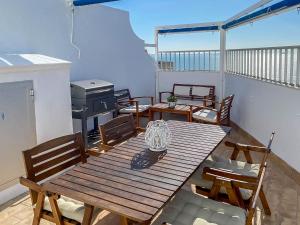 Lightbooking Atico Carlos vistas al mar