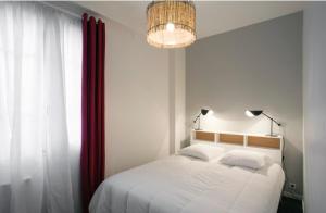 Appartements Charmant Appartement au calme : photos des chambres