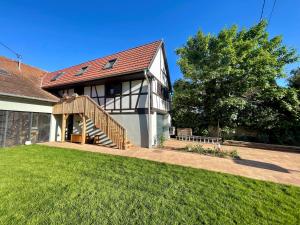 B&B / Chambres d'hotes Leo et Lysele - Magnifique logement au calme a 15 minutes du centre ville de Strasbourg : photos des chambres
