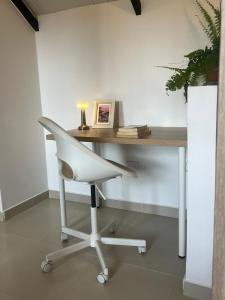 Un apartamento cálido y céntrico rodeado de jardines