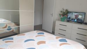 Maisons de vacances Maison neuve avec jardin : photos des chambres