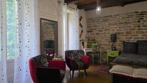 B&B / Chambres d'hotes D'Ici et D'Ailleurs : photos des chambres
