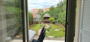 Apartma Sivi žako Novalja