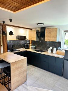 Domek Nad Koszarawą z ogrodowym jacuzzi