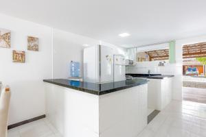 GB123 Ótimo Village 4 suítes a 250m da Praia