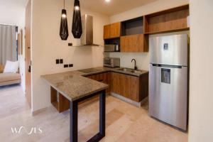 Modern 2BR Oasis with Pool Views at Chaan Ha