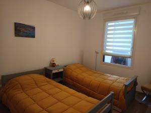 Appartements Annecity : photos des chambres