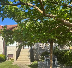 Villa Charneca, jardín y mar