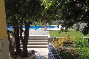 Family-friendly apartments with swimming pool Banjol, Rab - 5007