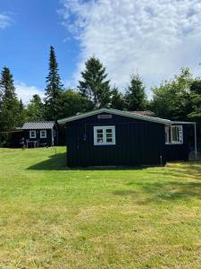 A Cozy Older Summerhouse On A Small Island