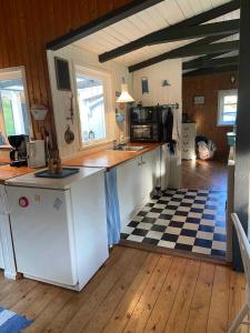 A Cozy Older Summerhouse On A Small Island