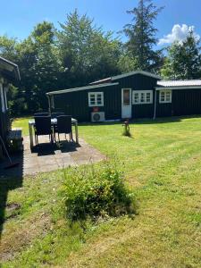 A Cozy Older Summerhouse On A Small Island
