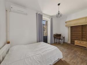 Maisons de vacances Maison pour 5 avec cour exterieure dans le centre : photos des chambres