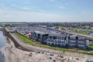 Vakantiewoning aan het strand - tuin en terras met haven- & zeezicht - Vista Maris - Nr 14