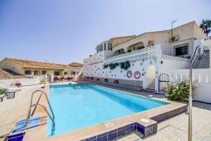 Charming Townhouse in El Faro, Spain, Studding Sea View & Community Pool