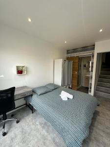 Maisons de vacances Maison Annees 30 - Terrasse - Parking gratuit - Proche CV : photos des chambres