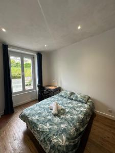 Maisons de vacances Maison Annees 30 - Terrasse - Parking gratuit - Proche CV : photos des chambres