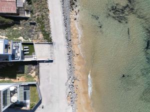 Nūa Residence - Beach at Your Doorstep by etouri