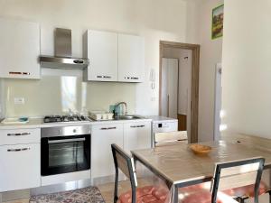 CASA MELODIA - immersa negli uliveti con vista sul mare Ionio