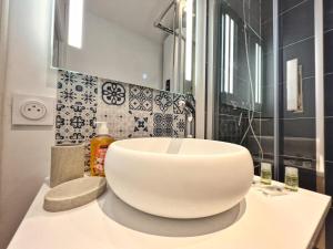 Lévasion Marine à la plage 2P