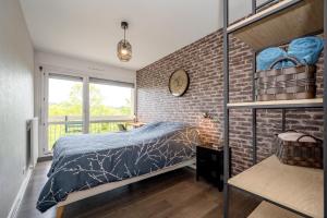 Appartements Le Broceliande - 8min de la Plage : photos des chambres