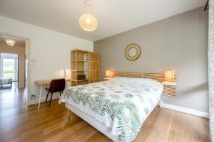 Appartements Le Broceliande - 8min de la Plage : photos des chambres