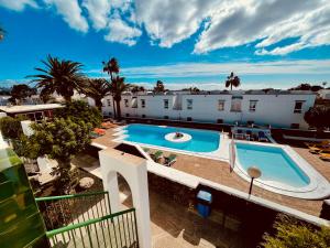 Relaxing upper floor Apartment- exclusive complex.