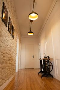 Appartements Au Petit Pelloutier : photos des chambres