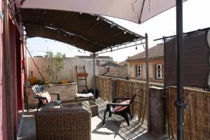 Appartements Au Petit Pelloutier : photos des chambres