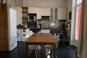 Appartements Au Petit Pelloutier : photos des chambres