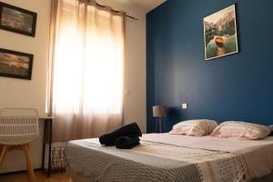 Appartements Au Petit Pelloutier : photos des chambres