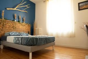 Appartements Au Petit Pelloutier : photos des chambres