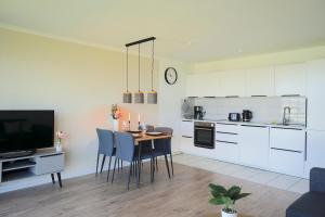 Moderne Ferienwohnung N°9 Stexwig mit Panorama Schleiblick