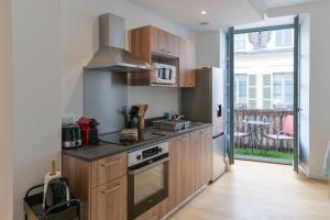Appartements L-Exclusif Central Premium : photos des chambres