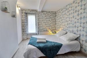 Appartements Les Apparts du Pont Vert - lit double - WiFi - tout inclus - 2 : photos des chambres