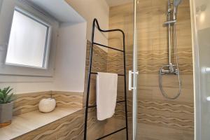 Appartements Les Apparts du Pont Vert - lit double - WiFi - tout inclus - 2 : photos des chambres